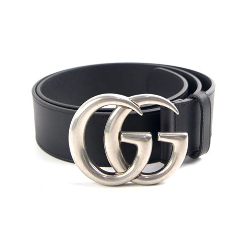 black gucci belt silver buckle.